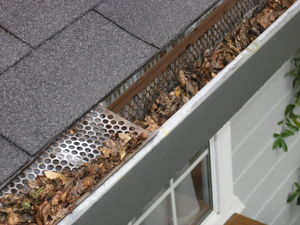 Metal gutter guard installation